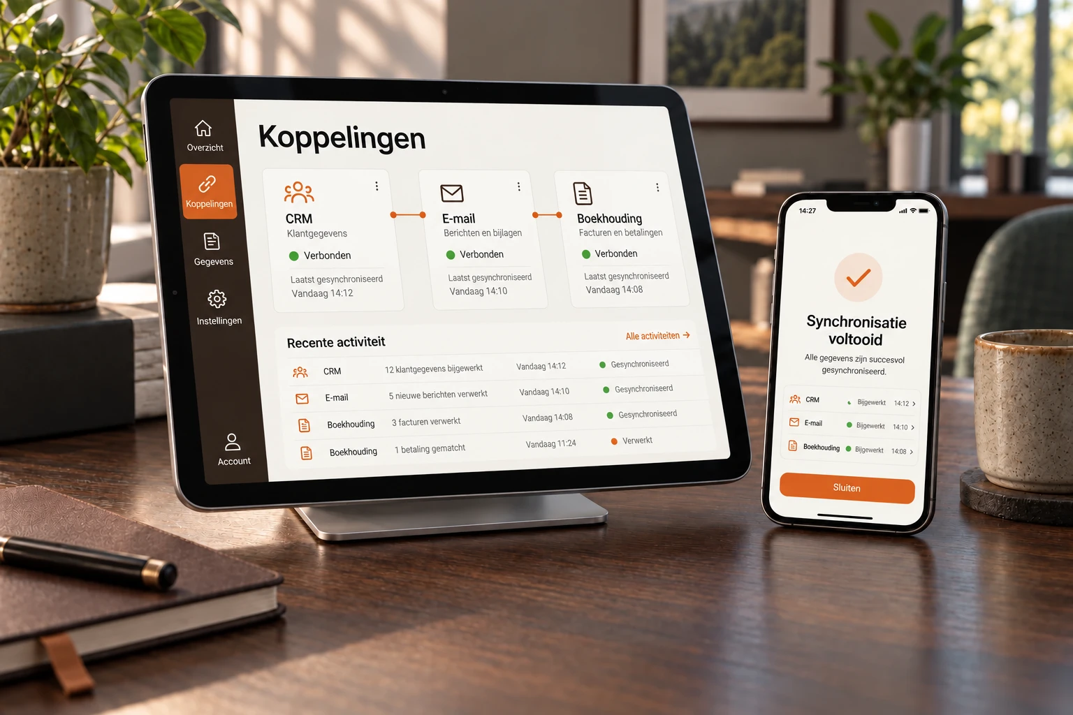 Tablet en telefoon met verbonden CRM, e-mail en boekhouding